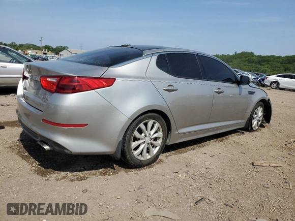 2015 Kia Optima EX с VIN 5XXGN4A71FG385837, выставлен на аукционе Copart как лот 60113905 с пробегом 172 274 миль миль и Списание • Salvage title. История ставок и продаж доступна на DreamBid. Изображение 3.