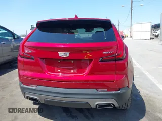 2021 Cadillac XT4 FWD Premium Luxury z VIN 1GYFZCR48MF004849, wystawiony jako IAAI lot #42131896 z przebiegiem 9 864 mil mil oraz . Historia ofert i sprzedaży dostępna na DreamBid. Obrazek 16.