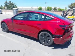 2025 Tesla Model 3 Long Range with VIN 5YJ3E1EA6SF917745, listed as a IAAI auction lot 42533673 with 7,305 mi miles and . Bid and sale history available at DreamBid. Image 3.