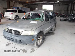 1999 Honda CR-V LX with VIN JHLRD2845XC018679, listed as a IAAI auction lot 39900180 with 222,656 mi miles. Bid and sale history available at carsss.com. Image 2.