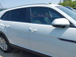 2022 Volkswagen Atlas SE z VIN 1V2HE2CA5NC225233, wystawiony jako IAAI lot #42366811 z przebiegiem 27 986 mil mil oraz . Historia ofert i sprzedaży dostępna na DreamBid. Obrazek 14.
