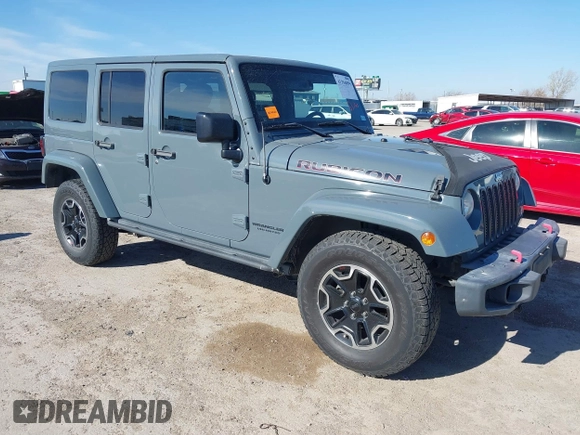 2015 Jeep Wrangler Unlimited Rubicon with VIN 1C4BJWFG7FL525724, listed as a IAAI auction lot 41394059 with 132,058 mi miles. Bid and sale history available at carsss.com. Image 1.