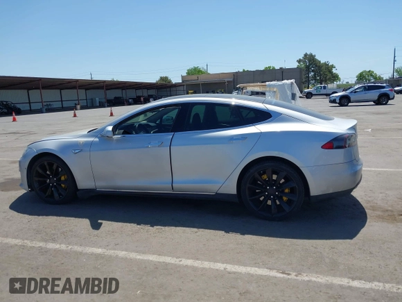 2013 Tesla Model S with VIN 5YJSA1CN5DFP11381, listed as a IAAI auction lot 42087803 with 146,818 mi miles and . Bid and sale history available at DreamBid. Image 13.