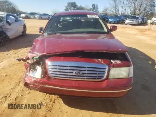 1998 Ford Crown Victoria LX с VIN 2FAFP74W3WX138757, выставлен на аукционе Copart как лот 87867945 с пробегом 148 827 миль миль и Списание • Salvage title. История ставок и продаж доступна на DreamBid. Изображение 5.