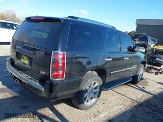2009 GMC Yukon Denali with VIN 1GKFK03249R163622, listed as a IAAI auction lot 41279580 with 185,441 mi miles. Bid and sale history available at carsss.com. Image 4.