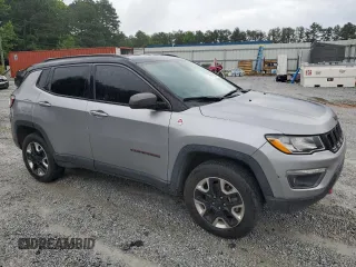 2018 Jeep Compass Trailhawk with VIN 3C4NJDDB4JT451409, listed as a Copart auction lot 58769305 with 135,562 mi miles and Clean title. Bid and sale history available at DreamBid. Image 4.