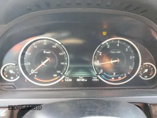 2014 BMW 7 Series 740i with VIN WBAYA6C55ED144487, listed as a Copart auction lot 77044014 with 86,149 mi miles and Salvage Title. Bid and sale history available at carsss.com. Image 9.