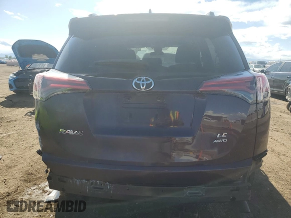 2018 Toyota RAV4 LE with VIN 2T3BFREV6JW739046, listed as a Copart auction lot 57475695 with 81,410 mi miles and Salvage title. Bid and sale history available at DreamBid. Image 6.
