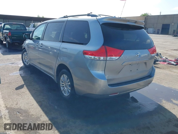 2011 Toyota Sienna XLE AAS with VIN 5TDYK3DC8BS156127, listed as a IAAI auction lot 42103980 with 129,851 mi miles. Bid and sale history available at carsss.com. Image 3.