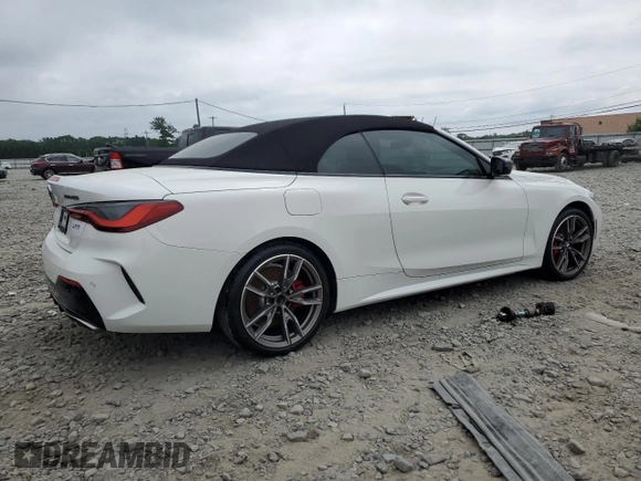 2022 BMW 4 Series M440i with VIN WBA53AT06NCK03623, listed as a Copart auction lot 62363465 with Not provided miles and Salvage title. Bid and sale history available at DreamBid. Image 3.