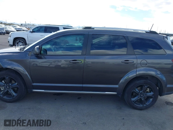 2018 Dodge Journey Crossroad z VIN 3C4PDCGBXJT473775, wystawiony jako IAAI lot #41740081 z przebiegiem 98 286 mil mil oraz . Historia ofert i sprzedaży dostępna na DreamBid. Obrazek 14.