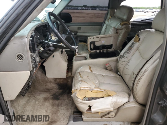 2002 Chevrolet Tahoe LS with VIN 1GNEC13Z52R230281, listed as a Copart auction lot 53447985 with 309,170 mi miles and Salvage title. Bid and sale history available at DreamBid. Image 7.