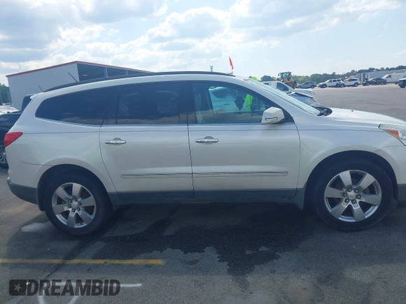 2011 Chevrolet Traverse LTZ with VIN 1GNKVLED5BJ167465, listed as a IAAI auction lot 42002979 with 167,271 mi miles and . Bid and sale history available at DreamBid. Image 13.