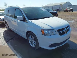 2016 Dodge Grand Caravan SXT with VIN 2C4RDGCG2GR390001, listed as a IAAI auction lot 41943622 with 127,328 mi miles. Bid and sale history available at carsss.com. Image 1.
