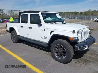 2022 Jeep Gladiator High Altitude with VIN 1C6HJTFG1NL167518, listed as a IAAI auction lot 41838411 with 20,885 mi miles and . Bid and sale history available at DreamBid. Image 1.