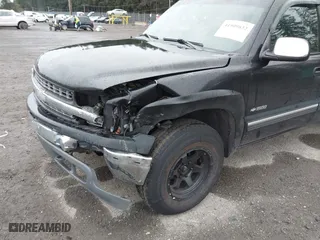 2000 Chevrolet Silverado 1500 LS with VIN 2GCEK19TXY1268976, listed as a IAAI auction lot 41909832 with 182,557 mi miles. Bid and sale history available at carsss.com. Image 6.
