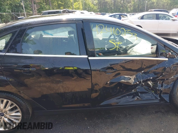 2018 Ford Focus Titanium with VIN 1FADP3J22JL220986, listed as a IAAI auction lot 42410253 with 40,791 mi miles and . Bid and sale history available at DreamBid. Image 13.