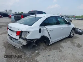 2014 Chevrolet Cruze 1LT with VIN 1G1PC5SB1E7184955, listed as a IAAI auction lot 42425326 with 144,600 mi miles and . Bid and sale history available at DreamBid. Image 4.