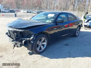 2016 Dodge Charger SXT with VIN 2C3CDXHG4GH196708, listed as a IAAI auction lot 41892104 with 142,765 mi miles. Bid and sale history available at carsss.com. Image 2.