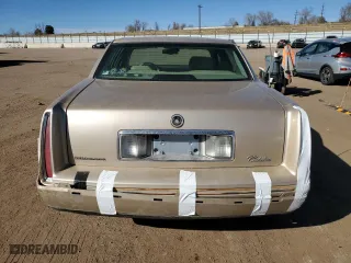1997 Cadillac DeVille DHS with VIN 1G6KE54Y6VU298810, listed as a Copart auction lot 48300565 with 234,488 mi miles and Salvage Title. Bid and sale history available at carsss.com. Image 6.