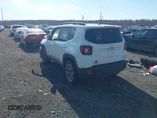 2017 Jeep Renegade Latitude with VIN ZACCJBBB8HPE64812, listed as a IAAI auction lot 41349525 with 106,966 mi miles. Bid and sale history available at carsss.com. Image 3.