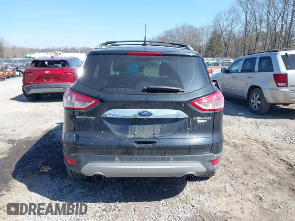 2014 Ford Escape Titanium with VIN 1FMCU9JX2EUA96338, listed as a IAAI auction lot 41806850 with 127,745 mi miles. Bid and sale history available at carsss.com. Image 16.