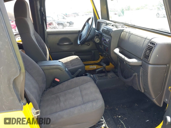 2005 Jeep Wrangler Sport with VIN 1J4FA49S65P381798, listed as a IAAI auction lot 42305109 with 71,880 mi miles and . Bid and sale history available at DreamBid. Image 5.