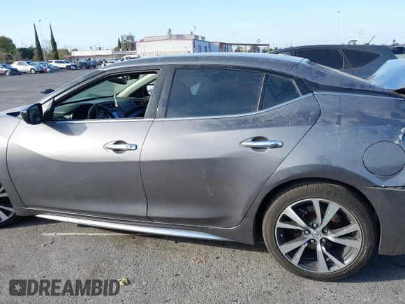 2017 Nissan Maxima SV with VIN 1N4AA6AP7HC387081, listed as a IAAI auction lot 41710501 with 144,538 mi miles. Bid and sale history available at carsss.com. Image 14.