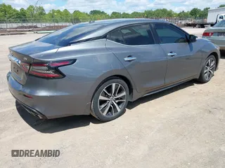 2020 Nissan Maxima SV with VIN 1N4AA6CV3LC378902, listed as a IAAI auction lot 42341718 with 71,129 mi miles and . Bid and sale history available at DreamBid. Image 4.