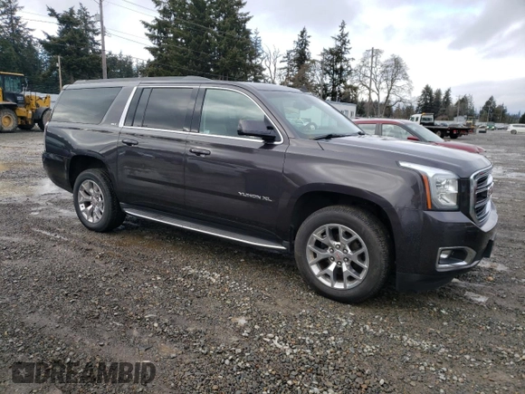 2015 GMC Yukon XL SLT with VIN 1GKS2HKC7FR282543, listed as a Copart auction lot 45602075 with 153,913 mi miles and Clean Title. Bid and sale history available at carsss.com. Image 4.