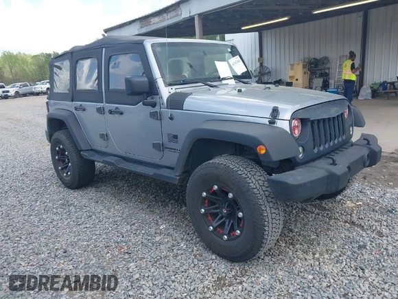 2014 Jeep Wrangler Unlimited Sport with VIN 1C4BJWDG3EL135351, listed as a IAAI auction lot 41947408 with 104,460 mi miles. Bid and sale history available at carsss.com. Image 1.