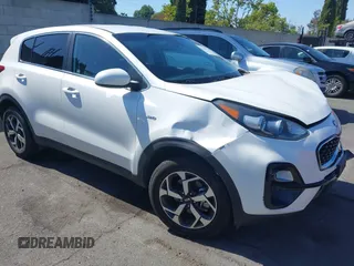 2021 Kia Sportage LX z VIN KNDPMCAC8M7914622, wystawiony jako IAAI lot #42261185 z przebiegiem 85 804 mil mil oraz . Historia ofert i sprzedaży dostępna na DreamBid. Obrazek 1.
