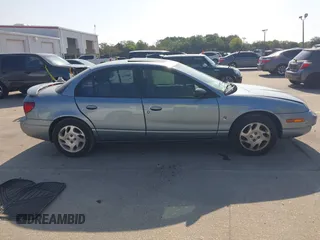2002 Saturn SL z VIN 1G8ZK54702Z130021, wystawiony jako IAAI lot #42091064 z przebiegiem 68 754 mil mil oraz . Historia ofert i sprzedaży dostępna na DreamBid. Obrazek 13.