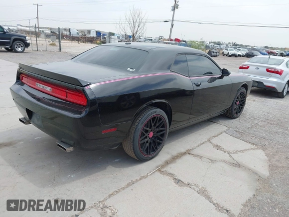 2012 Dodge Challenger SXT Plus with VIN 2C3CDYAG5CH268607, listed as a IAAI auction lot 41982122 with 188,091 mi miles. Bid and sale history available at carsss.com. Image 4.