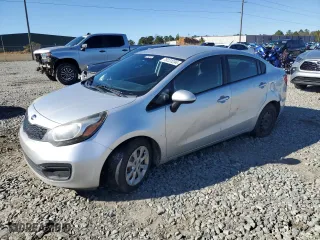 2014 Kia Rio LX with VIN KNADM4A32E6402156, listed as a Copart auction lot 79131234 with 152689 miles and Salvage Title. Bid and sale history available at carsss.com. Image 1.