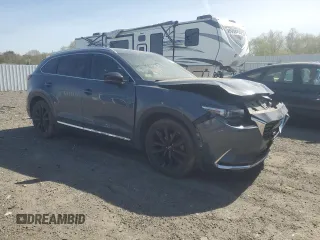 2021 Mazda CX-9 Carbon Edition with VIN JM3TCBDY7M0524887, listed as a Copart auction lot 55016555 with 61,934 mi miles and Salvage title. Bid and sale history available at DreamBid. Image 4.