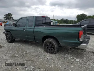 2000 Nissan Frontier XE with VIN 1N6DD26SXYC400648, listed as a Copart auction lot 58756855 with 148,051 mi miles and Salvage title. Bid and sale history available at DreamBid. Image 2.
