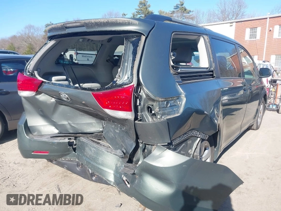 2011 Toyota Sienna LE AAS with VIN 5TDKK3DC0BS052186, listed as a IAAI auction lot 41808553 with 131,321 mi miles. Bid and sale history available at carsss.com. Image 4.