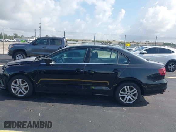 2017 Volkswagen Jetta S with VIN 3VW2B7AJ0HM285436, listed as a IAAI auction lot 42627136 with 88,873 mi miles and . Bid and sale history available at DreamBid. Image 14.
