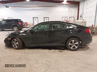 2019 Honda Civic Sedan LX with VIN 2HGFC2F69KH555697, listed as a IAAI auction lot 41664312 with 112,993 mi miles. Bid and sale history available at carsss.com. Image 14.