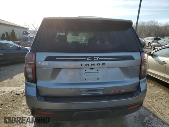 2023 Chevrolet Tahoe RST with VIN 1GNSKRKD4PR232976, listed as a Copart auction lot 87822015 with 58,484 mi miles and Salvage title. Bid and sale history available at DreamBid. Image 6.