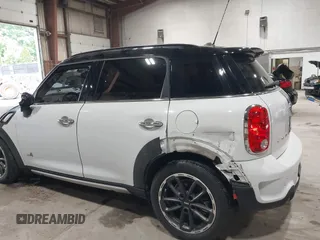 2016 MINI Countryman S with VIN WMWZC5C57GWU20085, listed as a IAAI auction lot 42403406 with 90,592 mi miles and . Bid and sale history available at DreamBid. Image 6.