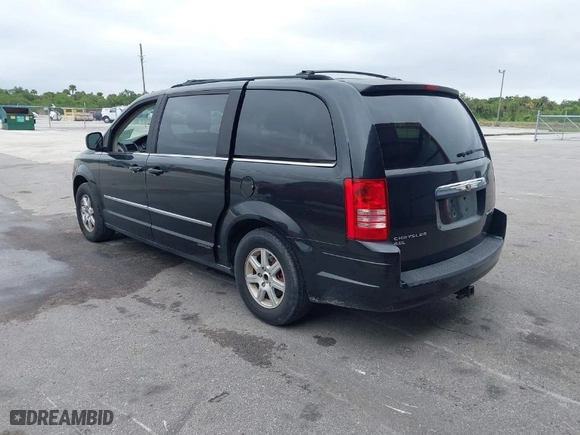 2010 Chrysler Town & Country Touring Plus with VIN 2A4RR8DX1AR496222, listed as a IAAI auction lot 41978794 with 145,715 mi miles. Bid and sale history available at carsss.com. Image 3.