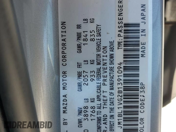 2011 Mazda 3 i Touring with VIN JM1BL1VG2B1391094, listed as a Copart auction lot 50051395 with 102,873 mi miles and Salvage Title. Bid and sale history available at DreamBid. Image 14.