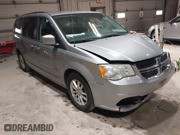 2014 Dodge Grand Caravan SXT z VIN 2C4RDGCGXER263963, wystawiony jako IAAI lot #41956264 z przebiegiem 138 815 mil mil oraz . Historia ofert i sprzedaży dostępna na DreamBid. Obrazek 1.