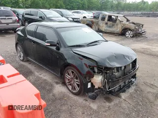 2012 Scion tC z VIN JTKJF5C74C3023169, wystawiony jako IAAI lot #42008116 z przebiegiem 185 499 mil mil oraz . Historia ofert i sprzedaży dostępna na DreamBid. Obrazek 1.
