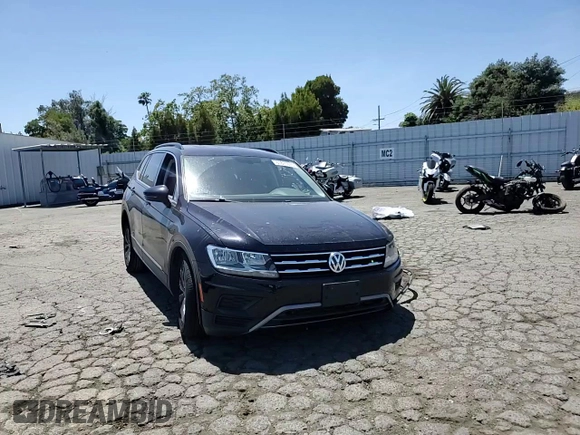 2018 Volkswagen Tiguan SEL z VIN 3VV2B7AX4JM153956, wystawiony jako Copart lot #61871675 z przebiegiem 84 252 mil mil oraz Szkoda całkowita • Salvage title. Historia ofert i sprzedaży dostępna na DreamBid. Obrazek 14.