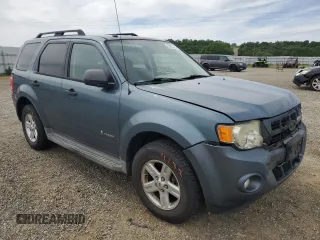 2010 Ford Escape Hybrid z VIN 1FMCU4K35AKB31202, wystawiony jako Copart lot #52922525 z przebiegiem 152 303 mil mil oraz Szkoda całkowita • Salvage title. Historia ofert i sprzedaży dostępna na DreamBid. Obrazek 4.