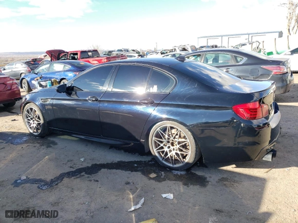 2016 BMW M5 with VIN WBSFV9C57GD595836, listed as a Copart auction lot 38796484 with 48,561 mi miles and Salvage Title. Bid and sale history available at carsss.com. Image 2.
