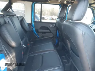 2022 Jeep Wrangler Unlimited Sahara z VIN 1C4JJXP64NW192452, wystawiony jako IAAI lot #41631295 z przebiegiem 23 738 mil mil oraz . Historia ofert i sprzedaży dostępna na DreamBid. Obrazek 8.